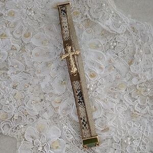 Elegant Gold and Silver Filigree Bracelet